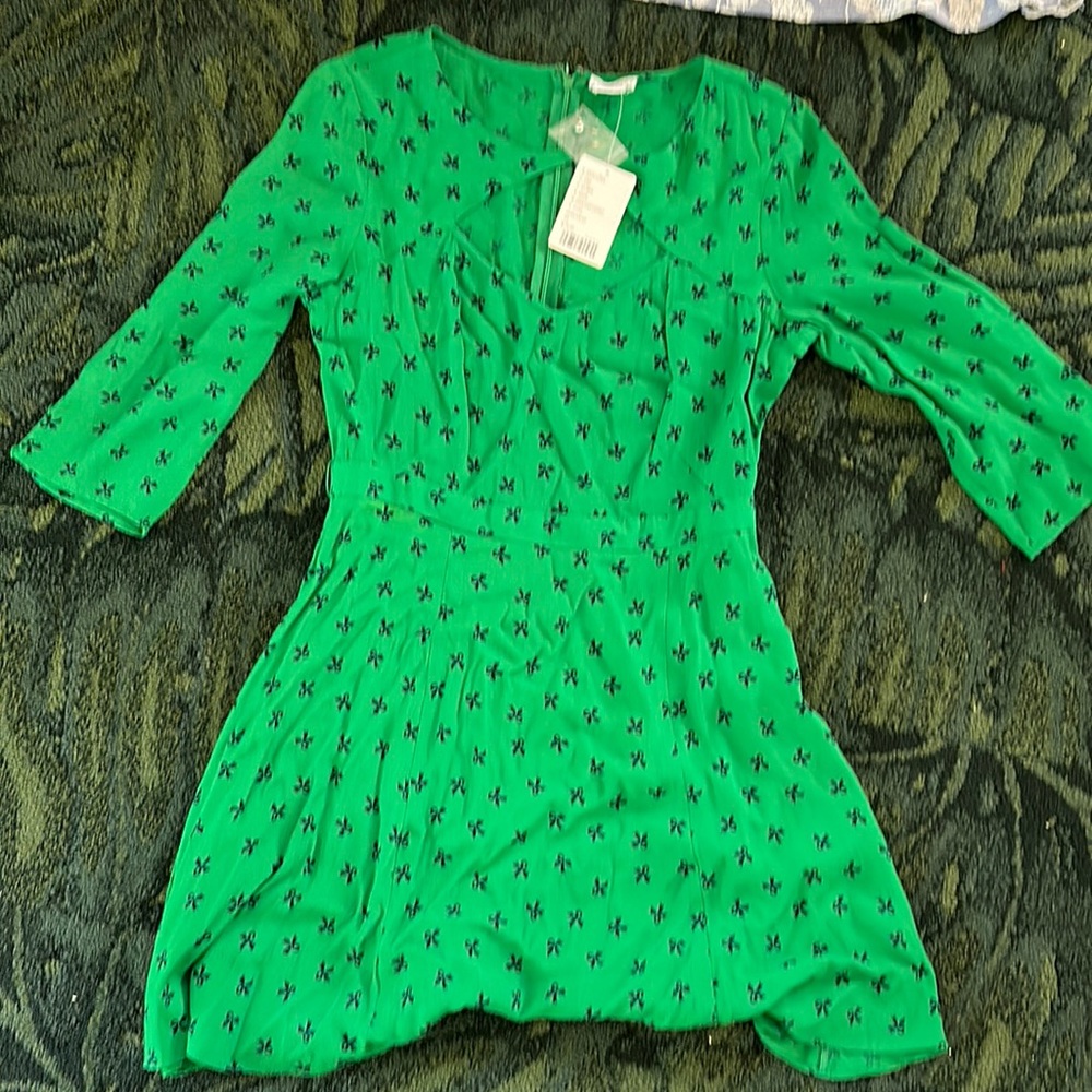 Dress size 10. Never worn.